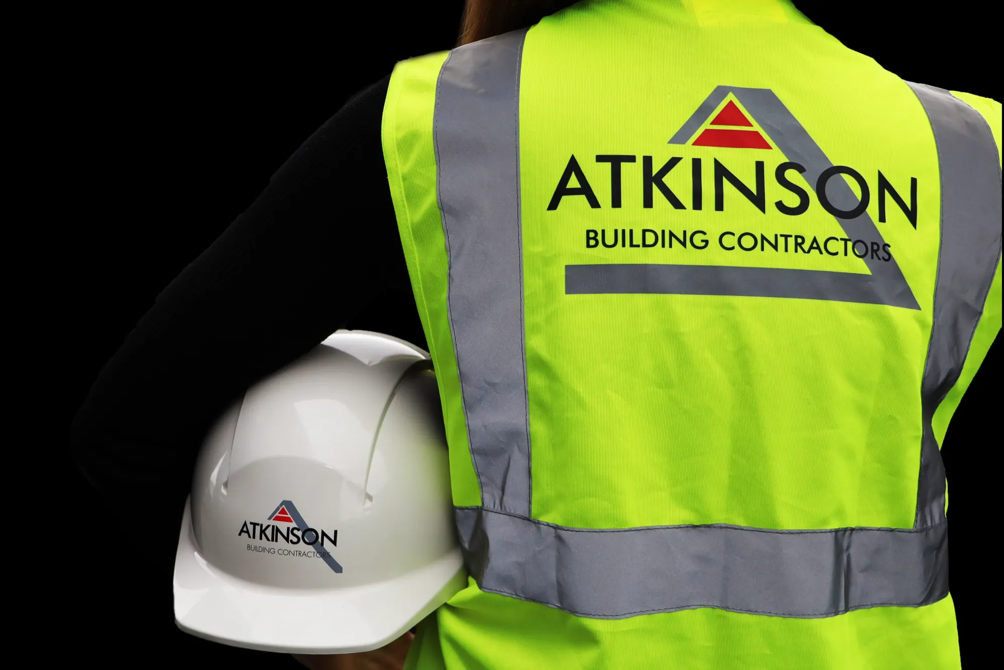 Atkinson Building Contractors hi-vis vest on a Cumbria site